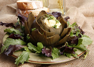 Baked Artichoke Filled With Dipping Sauce