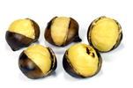 five whole chestnuts in their shells cracked open