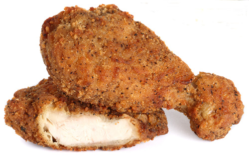 two pieces of bone-in breaded chicken