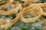 classic green bean casserole topped with crispy onion rings