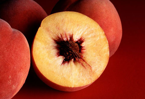 three whole rpeaches and one half peach