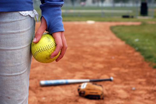 softball player holding a softball